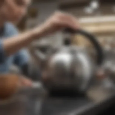 Consumer examining a stainless steel teapot in a store