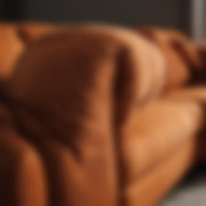 Close-up of fabric texture on brown and orange sofa