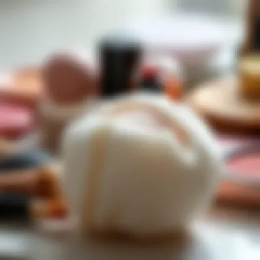 Close-up of a soft makeup puff with beauty products