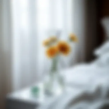 Minimalist glass bedside carafe with fresh flowers