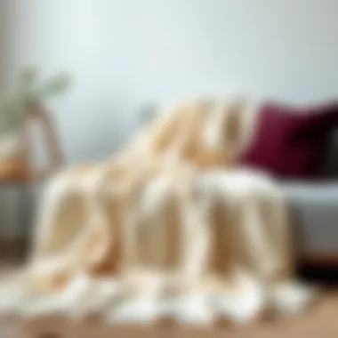 Luxurious cotton blanket draped over a stylish couch