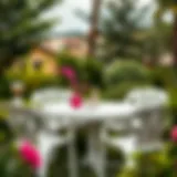 A stylish outdoor plastic garden table set surrounded by lush greenery