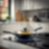 Elegant steel frying pan in a modern kitchen setting